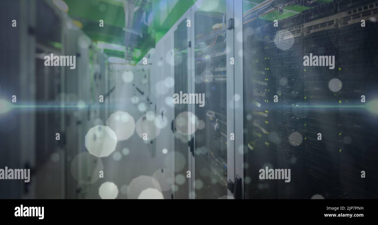Image of spots over server room Stock Photo