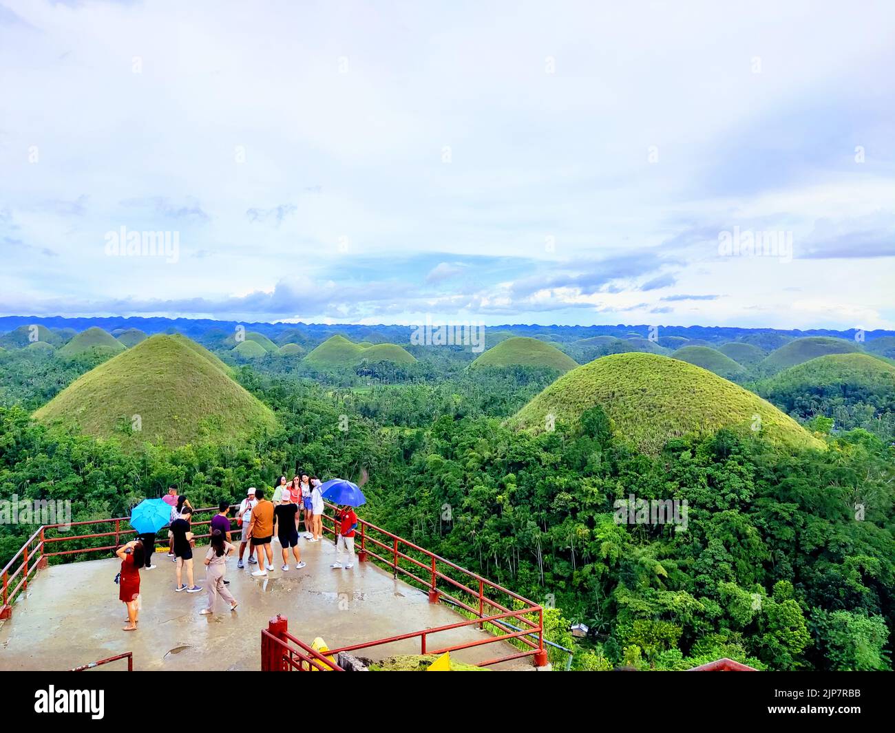 The aerial view of the tourists enjoying the beautiful Chocolate Hills