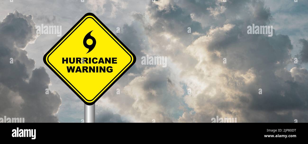 hurricane warning sign on cloudy background Stock Photo - Alamy