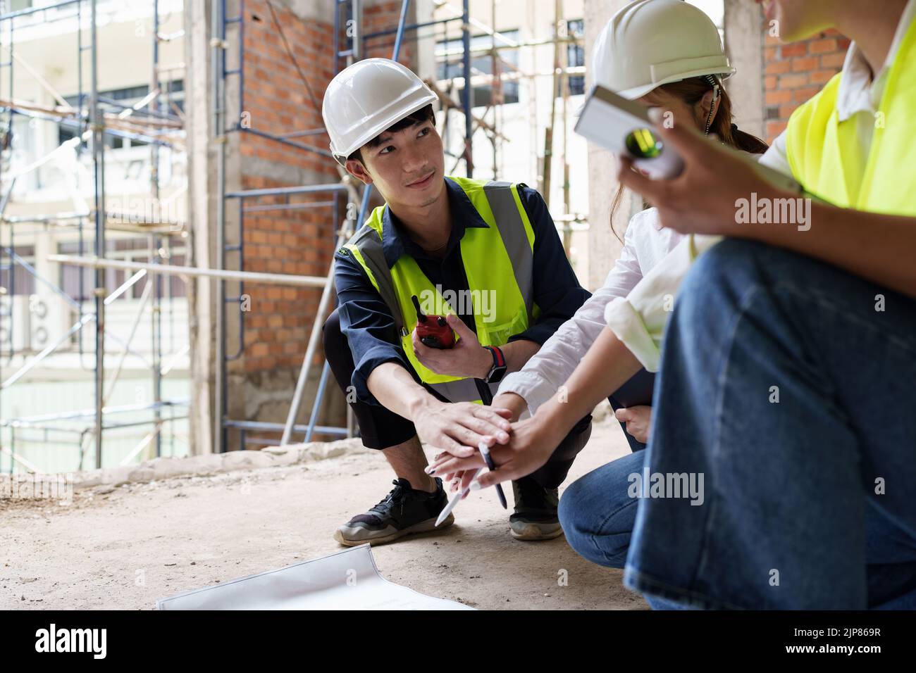Structural Engineer At Work Structural engineer and architect discussing and working with ...