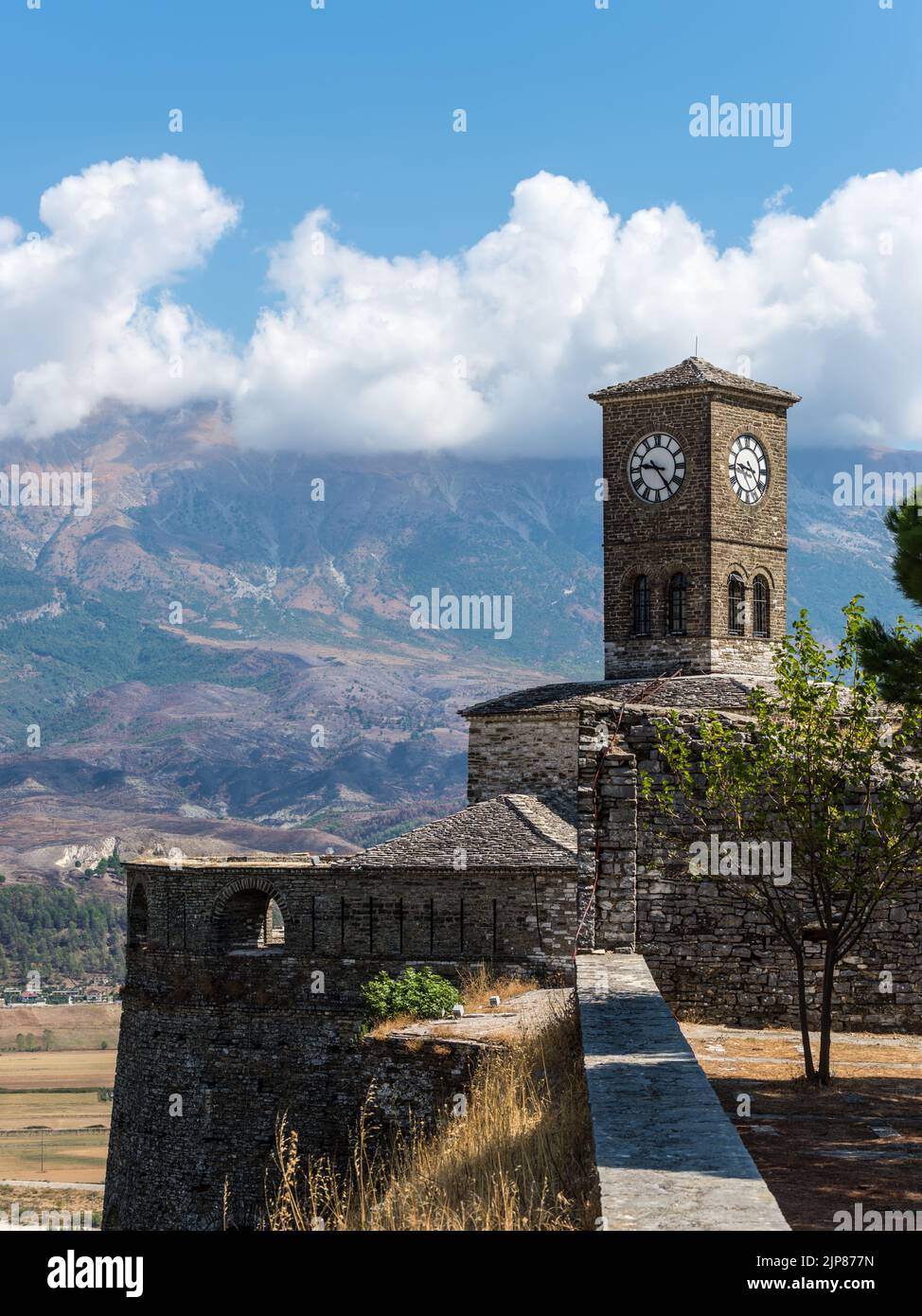 Clock tower and fortress at Gjirokaster, a beautiful town in Albania where the Ottoman legacy is clearly visible Stock Photo