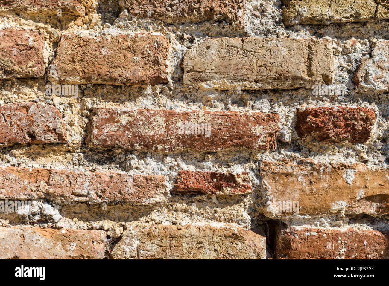 Brickwork from the 11th century in Albania as a background. Ancient brick wall. Grunge brick wall background. Background of old vintage brick wall. Stock Photo