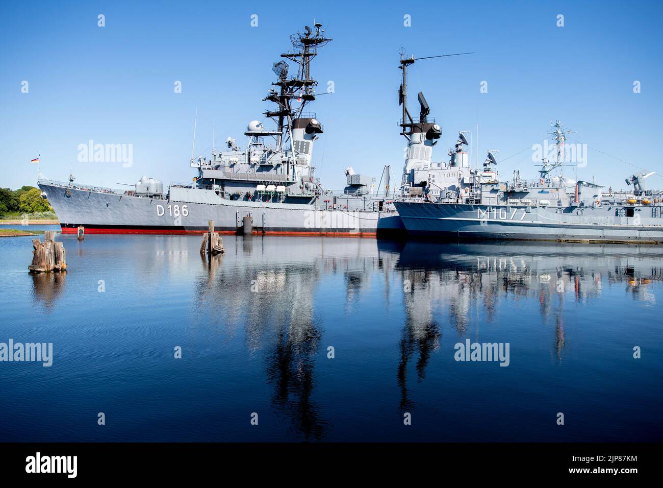 Wilhelmshaven, Germany. 12th Aug, 2022. The former destroyer "Mölders" (l, D186) and the minehunting boat "Weilheim" (M1077) are located in the Naval Museum on South Beach. The former warship was decommissioned in 2003 and has been open to visitors to the museum since 2005. Credit: Hauke-Christian Dittrich/dpa/Alamy Live News Stock Photo