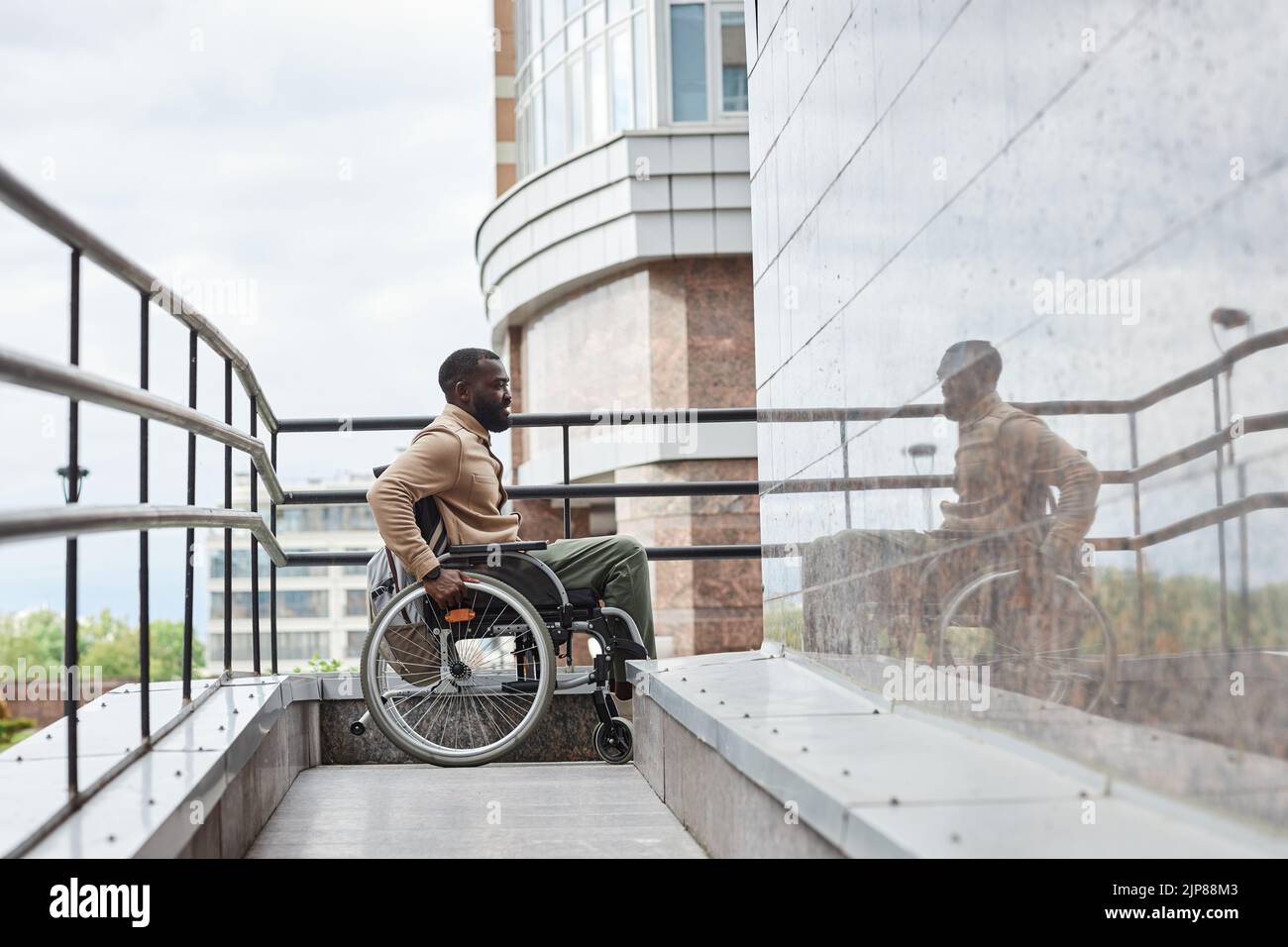 Person wheelchair stairs hi-res stock photography and images - Page 5 -  Alamy