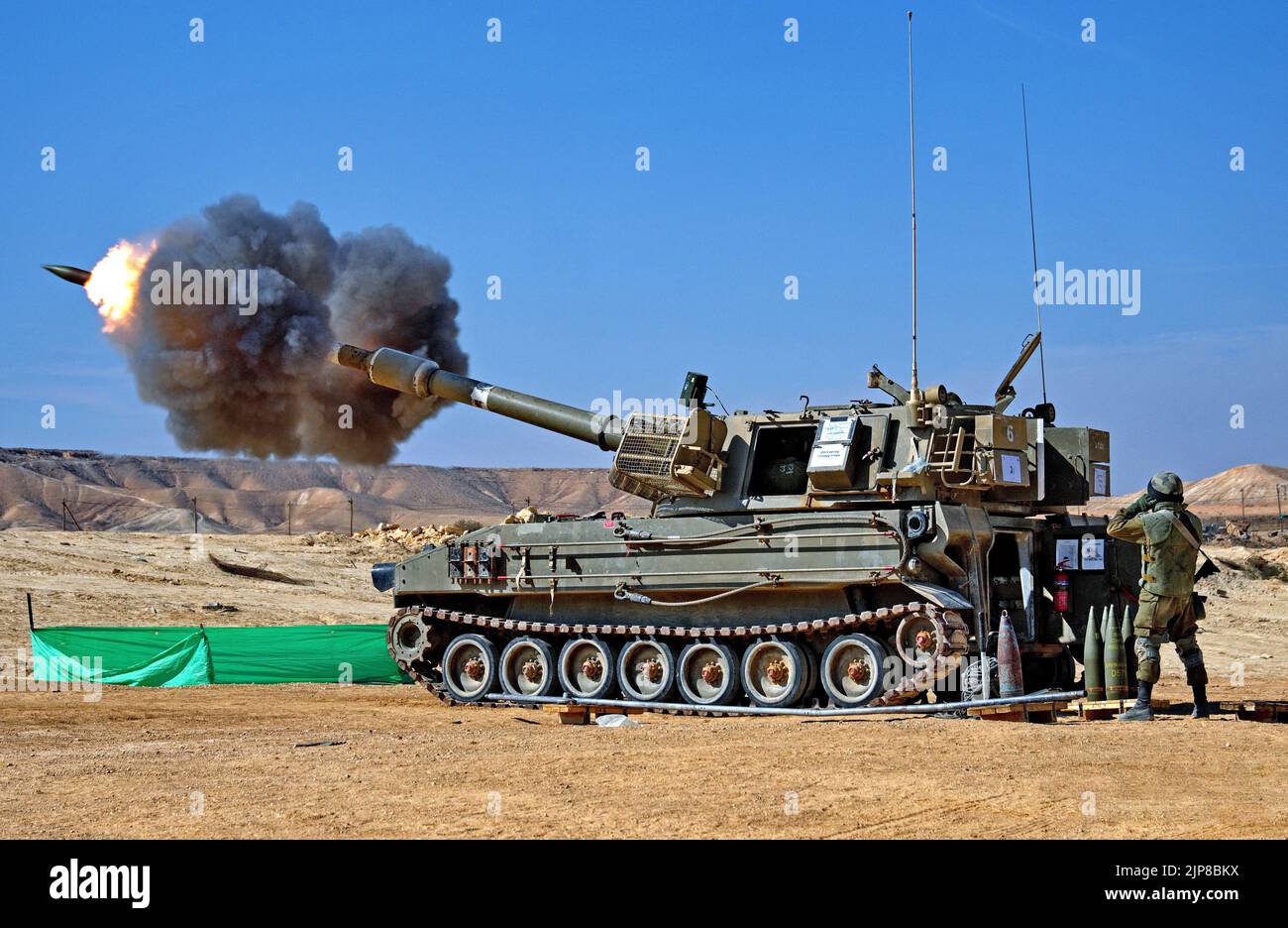 M-109 modern Self-propelled artillery firing a load Self-propelled artillery (also called locomotive artillery) is artillery equipped with its own pro Stock Photo
