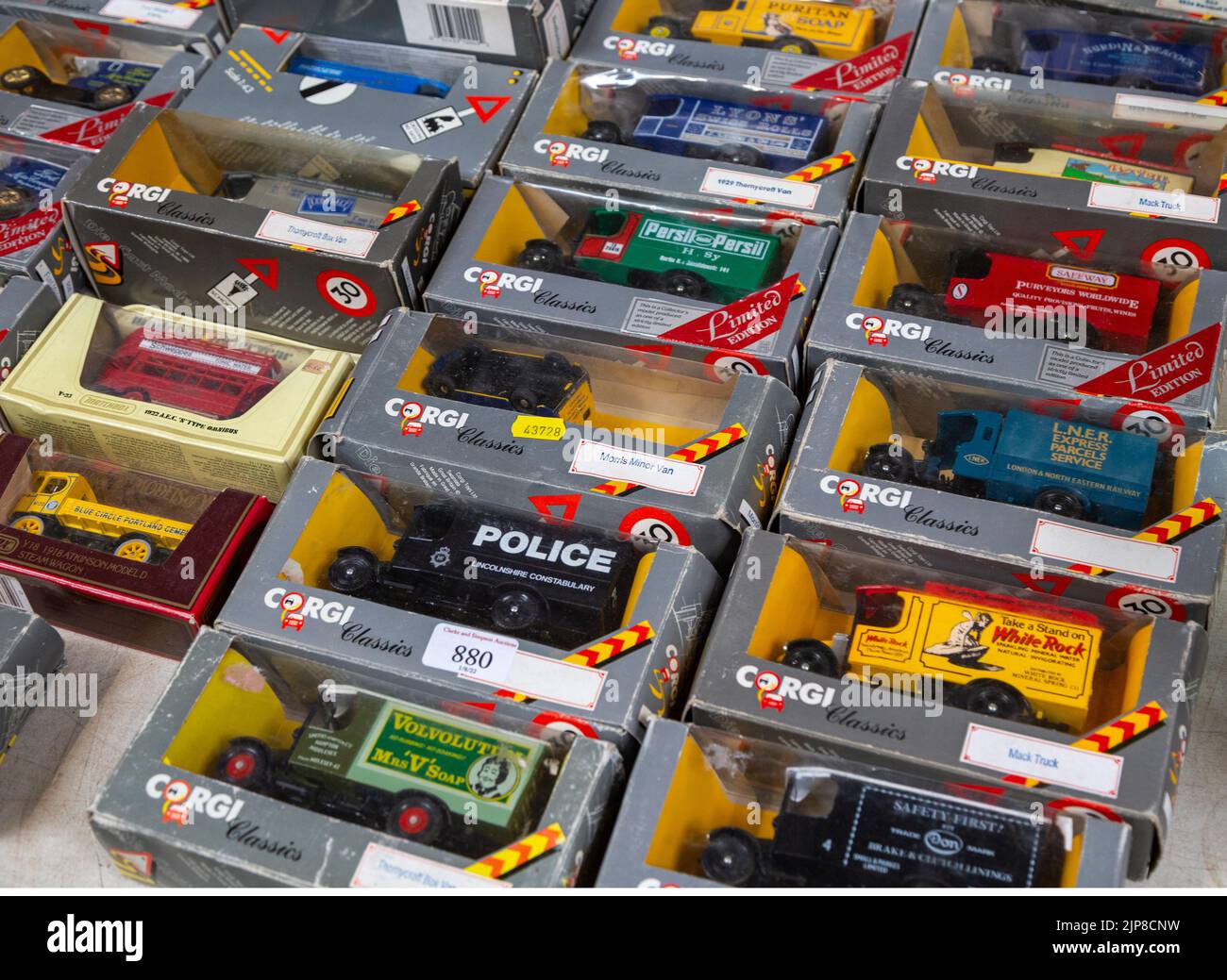 A selection of boxed Corgi model vehicles on display in auction room, UK Stock Photo