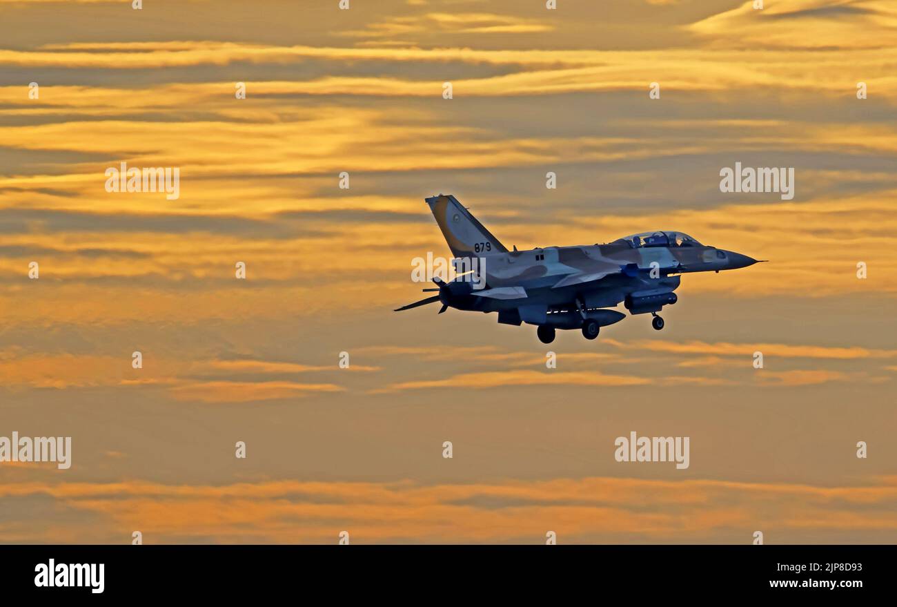 Israeli Air Force (IAF) General Dynamics F-16 in flight at sunset Stock Photo