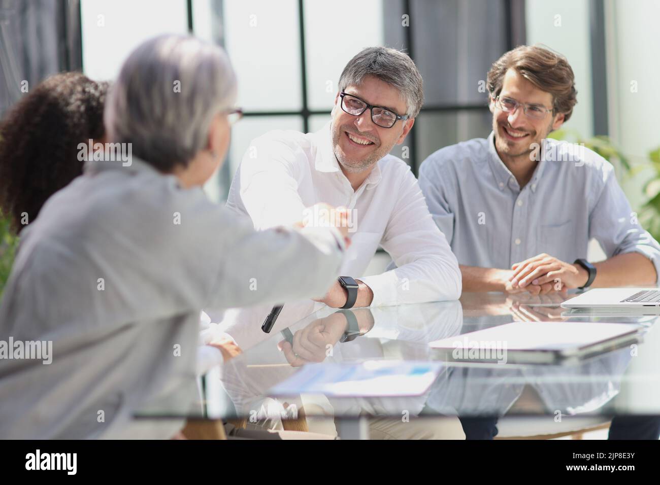 discussion of successful business people in the office Stock Photo