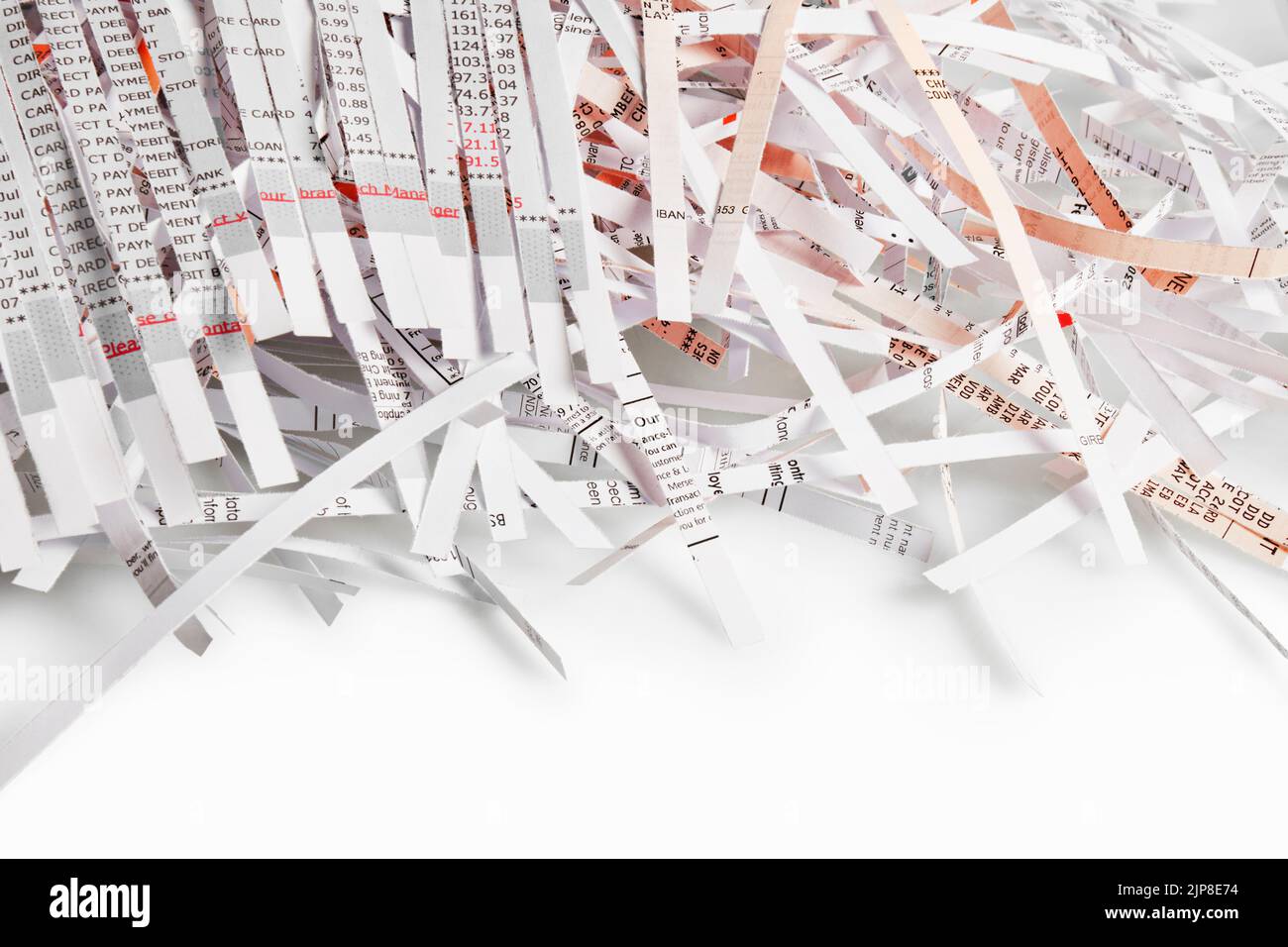 Shredded Bills and Bank Statements Stock Photo