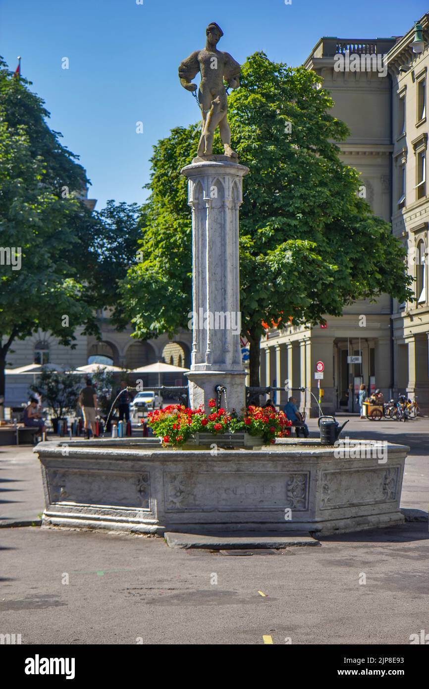 Medieval Bärenplatz statue and fountain in the Old Town, Bern, Switzerland Stock Photo