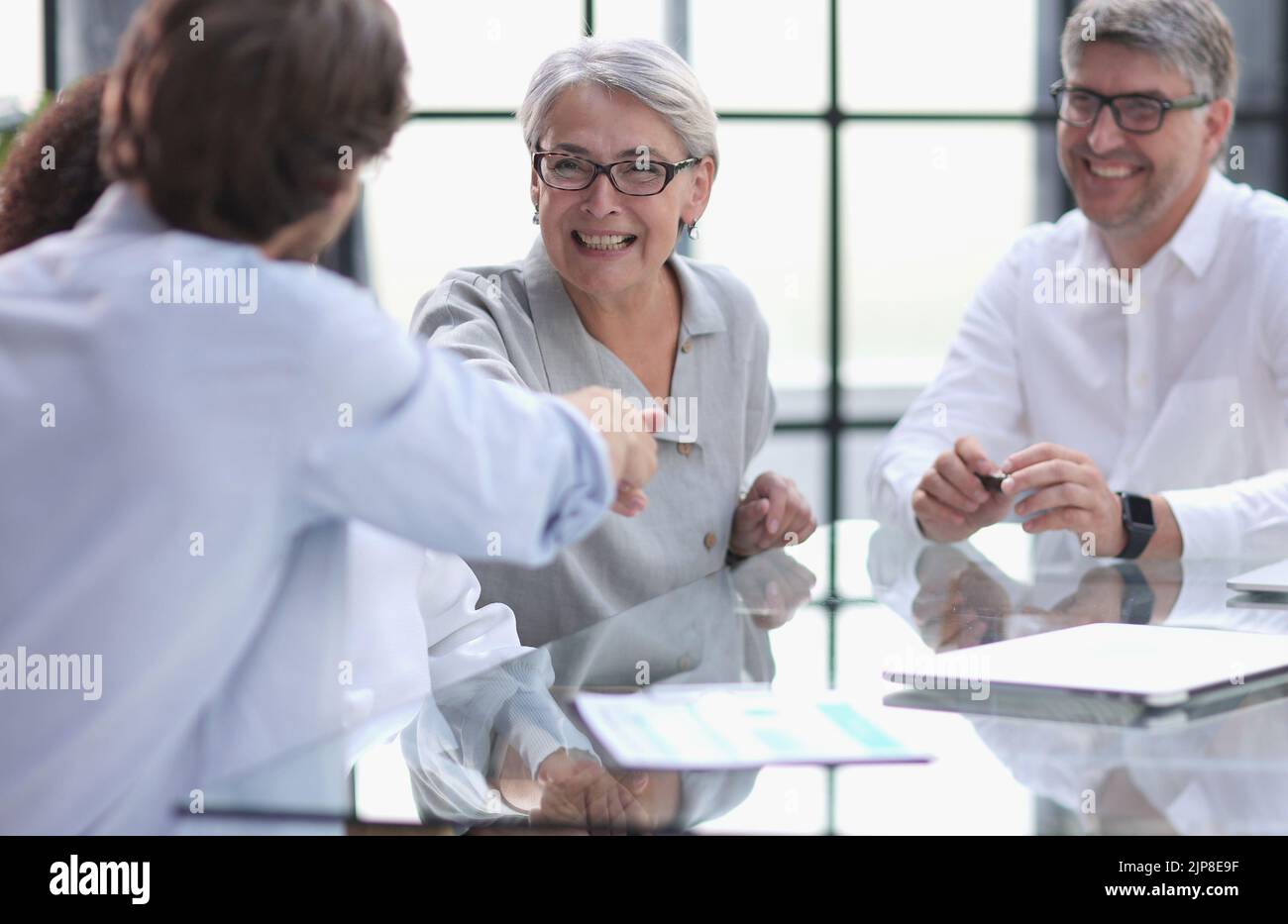 discussion of successful business people in the office Stock Photo