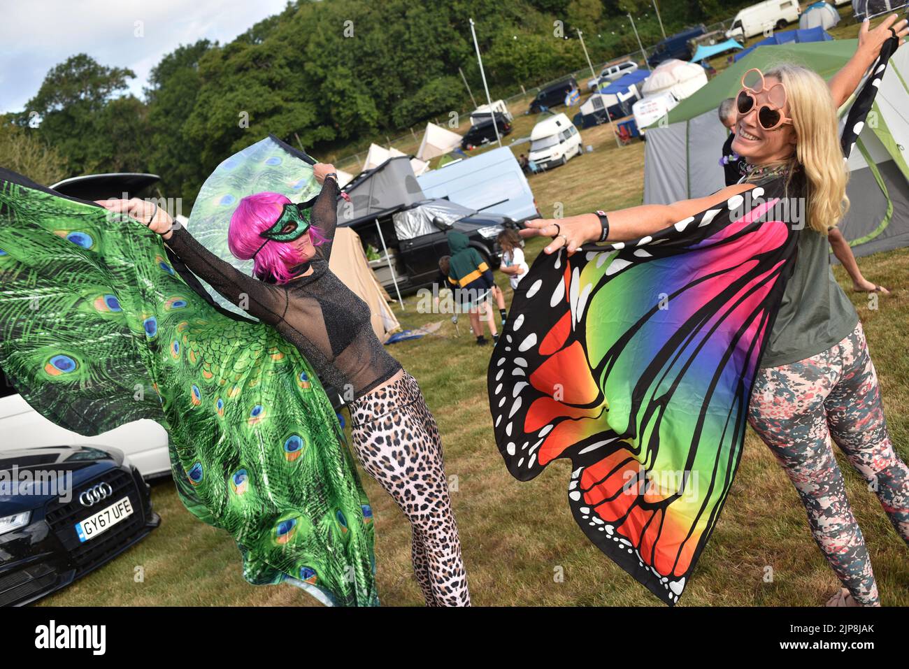 Festival goers in the camping area at the family oriented festival Camp Bestival, Lulworth Castle and Estate, Dorset July 28 - 31 2022 Stock Photo