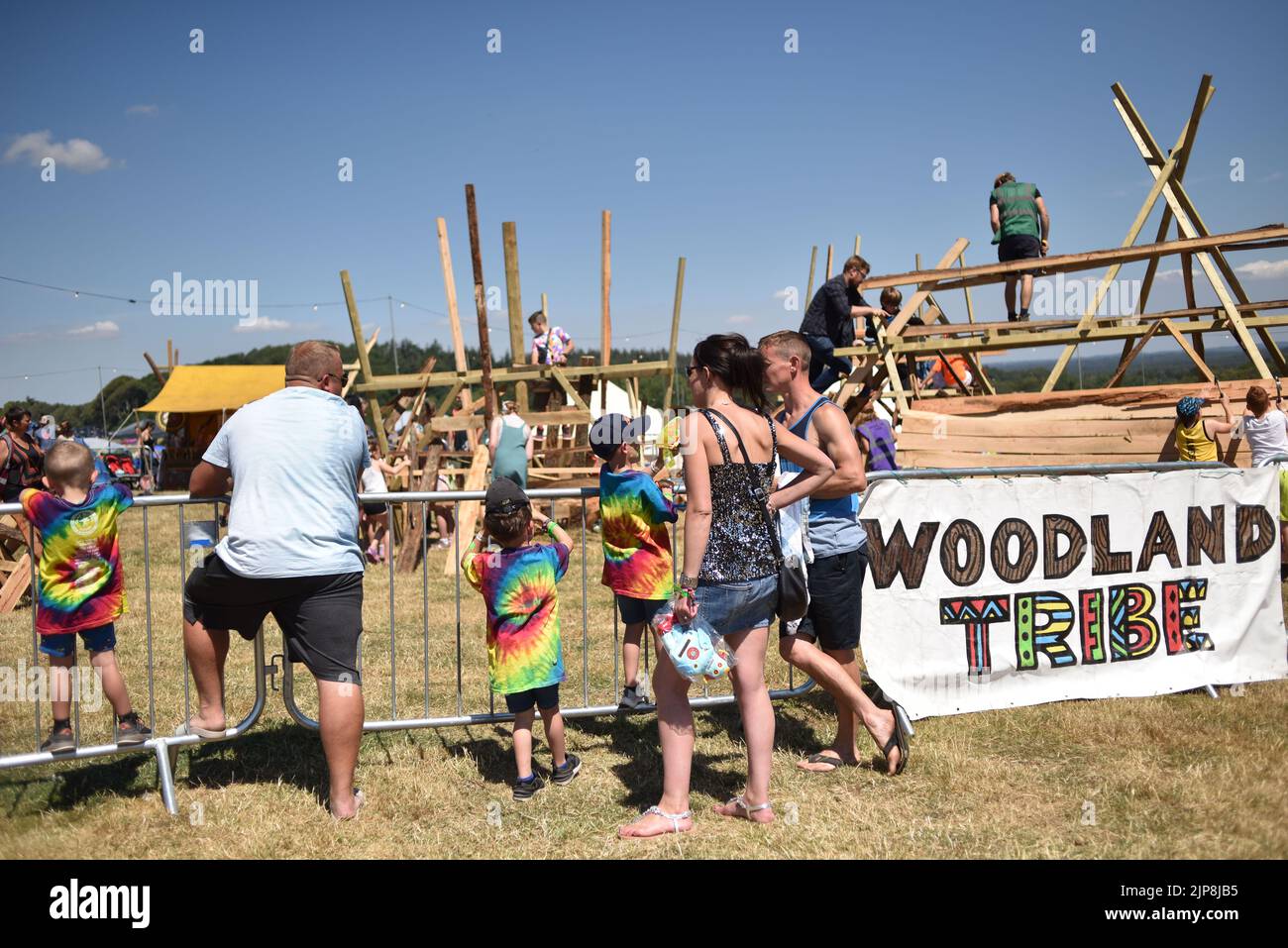 Wood working in the Woodland Tribe stand. Scenes of the family oriented festival Camp Bestival, Lulworth Castle and Estate, Dorset July 28 - 31 2022 Stock Photo