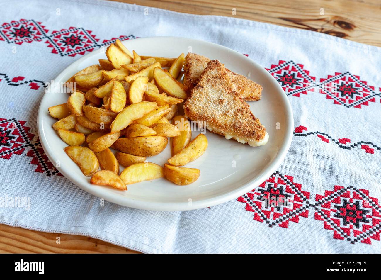 fried cheese served with french fries Stock Photo