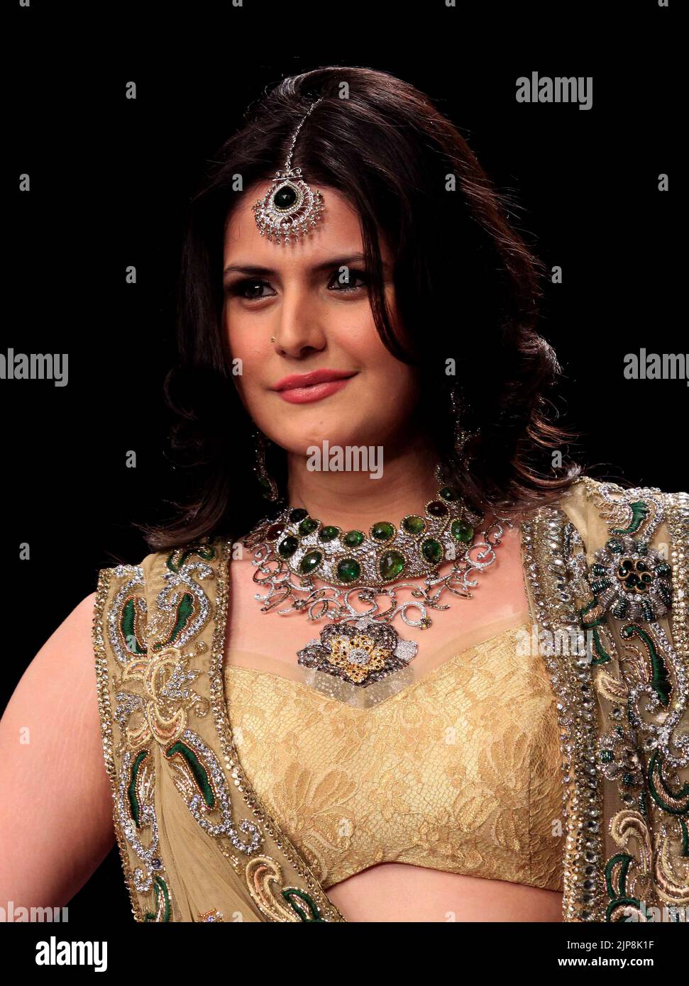 Bollywood actress Zarine Khan wearing jewellery at India International Jewellery Week in Mumbai, India on August 21, 2012 Stock Photo