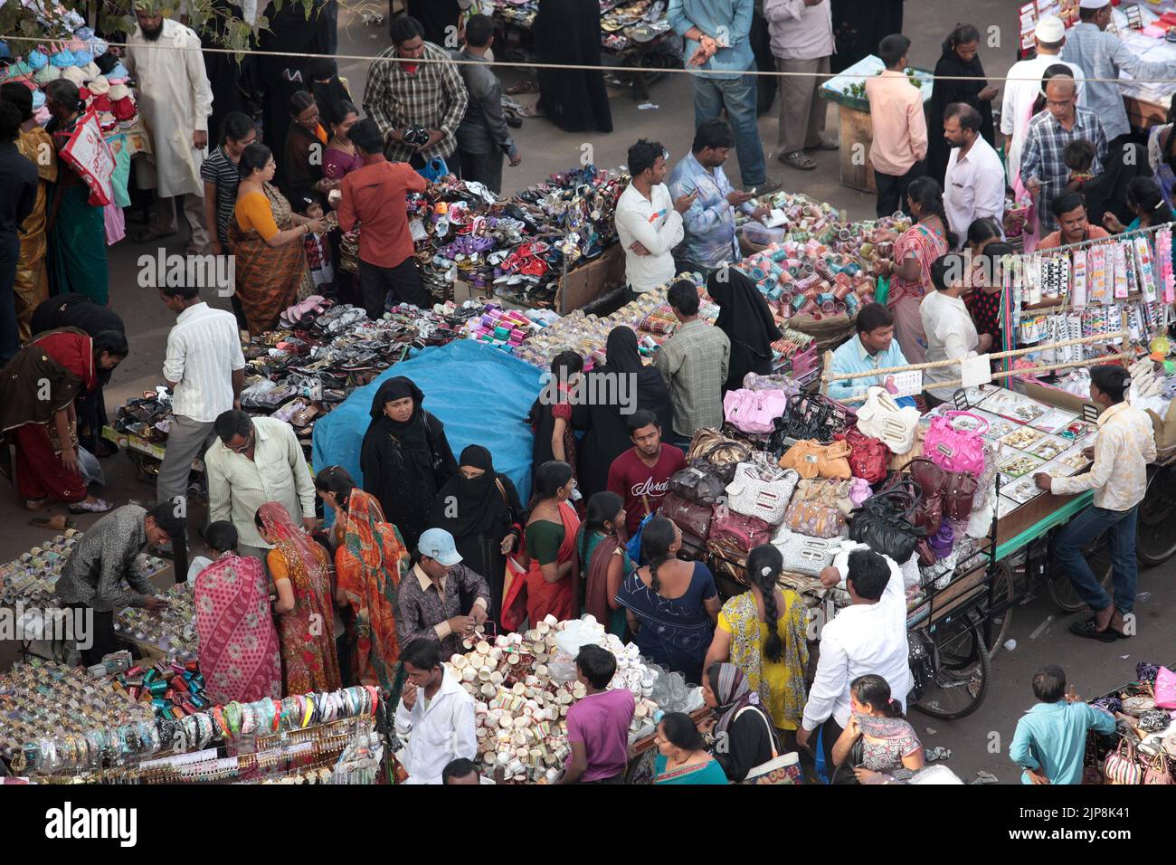 Hawkers selling crowded street near Charminar, Hyderabad, Andhra Pradesh, India Stock Photo