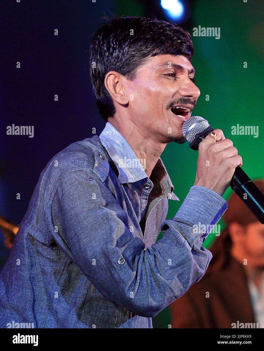 Folk singer Dr Ganesh Chandanshive singing at event in Mumbai, India on September 7, 2012 Stock Photo