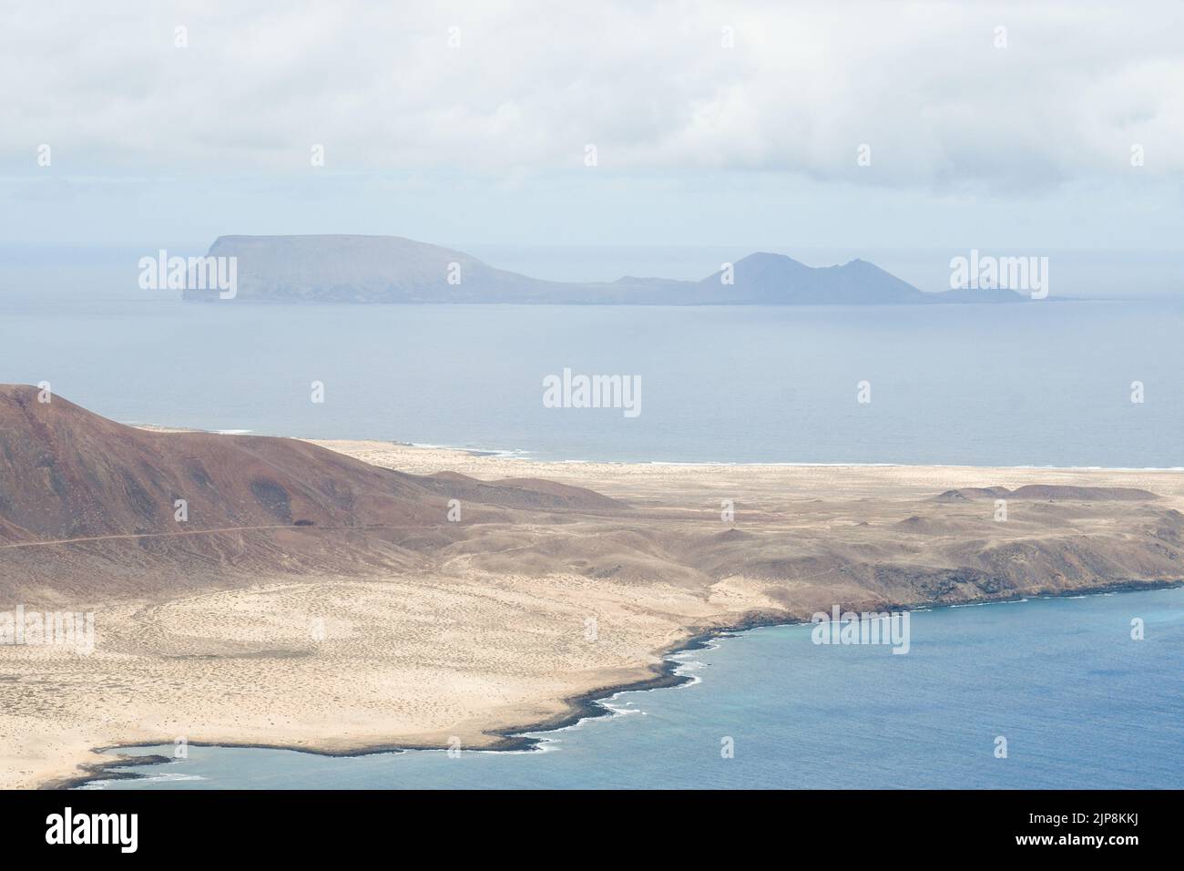 Island of La Graciosa and Isla de la Alegranza from the Mirador del Río in Lanzarote Stock Photo