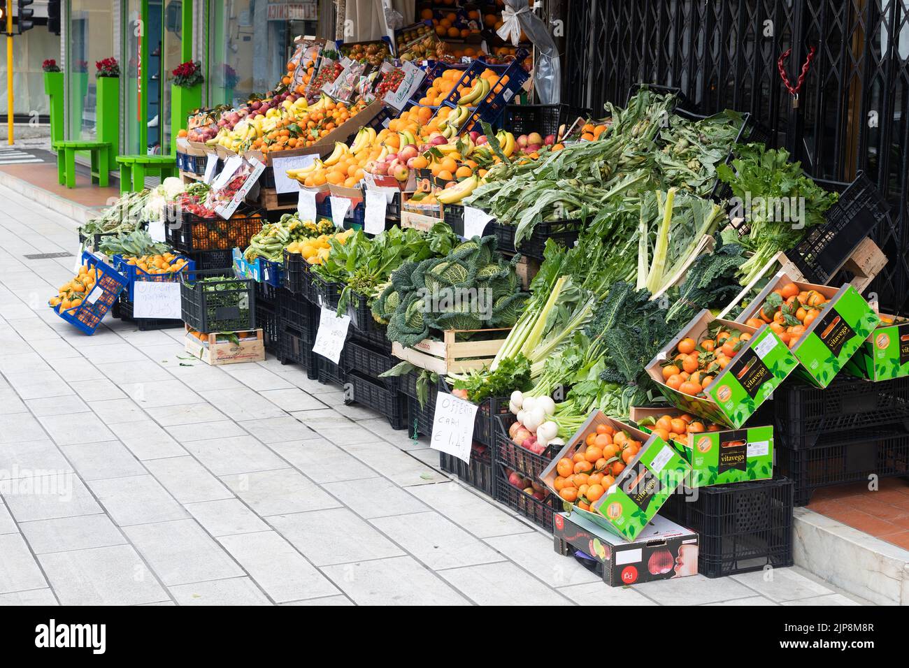 Carrara, Italy - August 16, 2022 - External exhibition of an Italian fruit and vegetable shop. Stock Photo