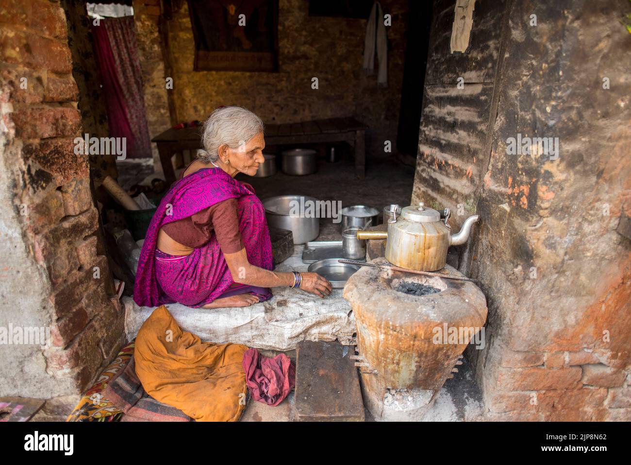 Old woman tea vendor, Varanasi, Banaras, Benaras, Kashi, Uttar Pradesh, India Stock Photo