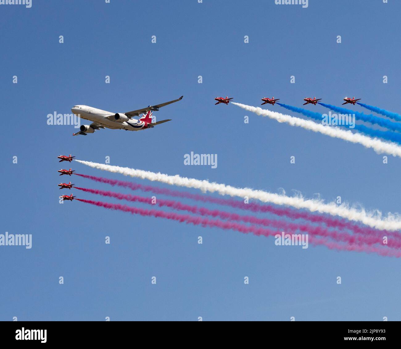 Airbus A330 Voyager in 'United Kingdom' livery flies in formation with the Red Arrows at the 2022 Royal International Air Tattoo Stock Photo