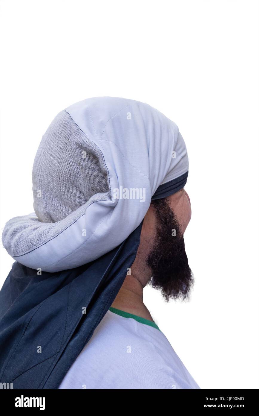 Rear view of a costalero bearers with the Costal (Sack) Piece of cloth that bearers place on their head and neck in order to better carry the pasos (p Stock Photo