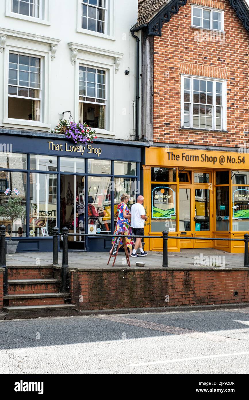 Dorking, Surrey Hills, London UK, August 14 2022, People Walking Past A Row Of Traditional Retail High Street Shop Fronts Stock Photo