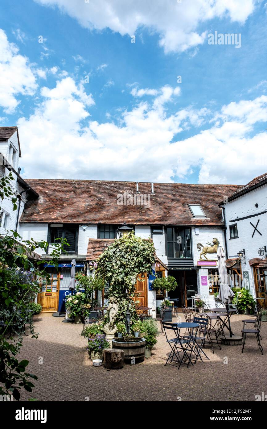 Dorking, Surrey Hills, London UK, August 14 2022, Traditional Old Courtyard Cafe Or Restaurant With Tables And Chairs And No People Stock Photo