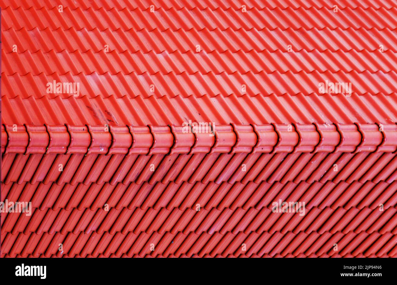 Abstract red metal shingles roof texture, background photo, top view Stock Photo