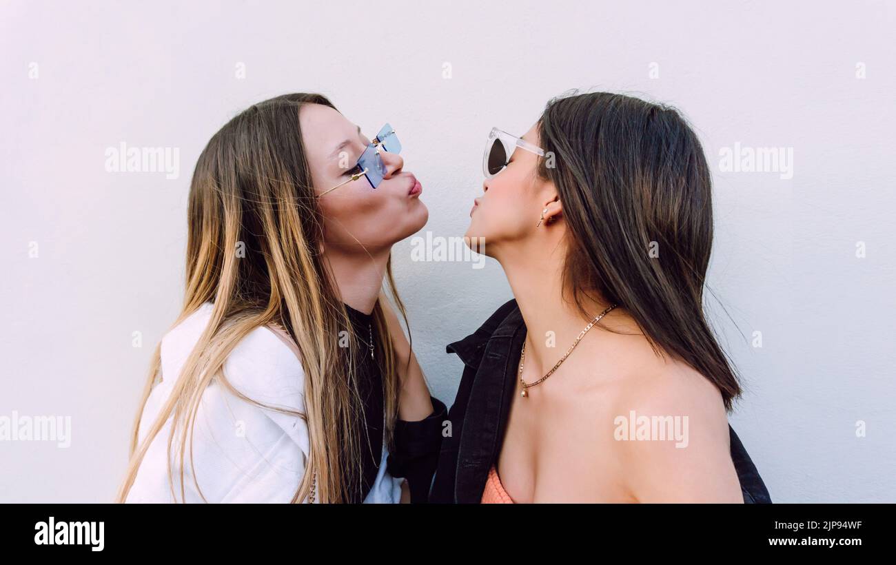 Greeting kiss women hi-res stock photography and images - Alamy 