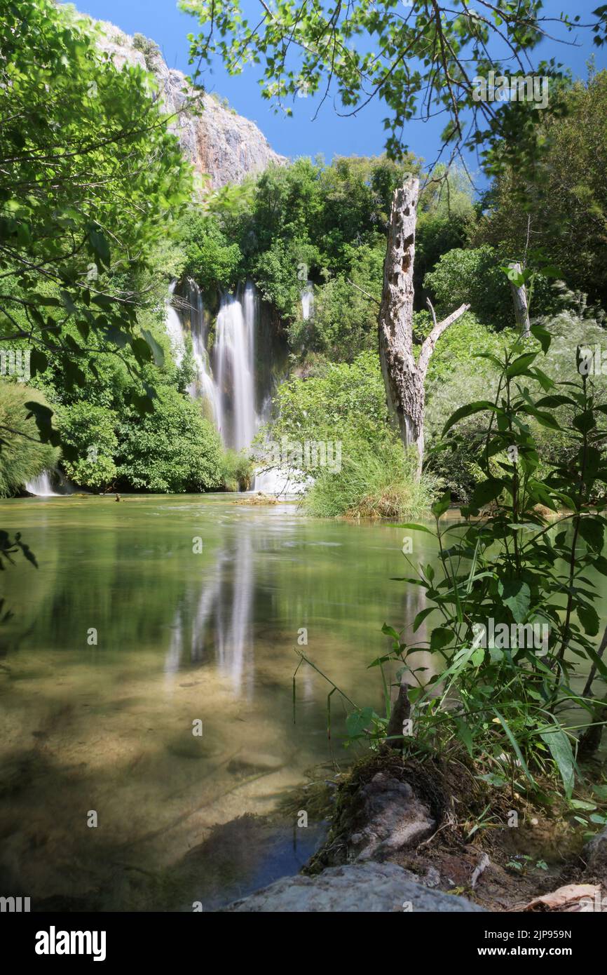 Beautiful silky waterfall on Krka river and surrounding natural habitat, National park Krka, Croatia Stock Photo