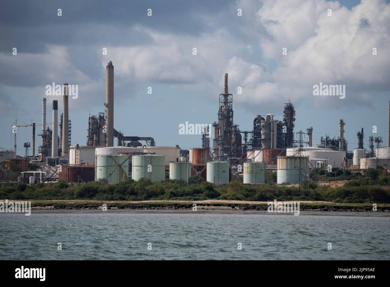 The huge oil refining and petroleum storage complex at Fawley sits close to Southampton Water on the South coast of England Stock Photo