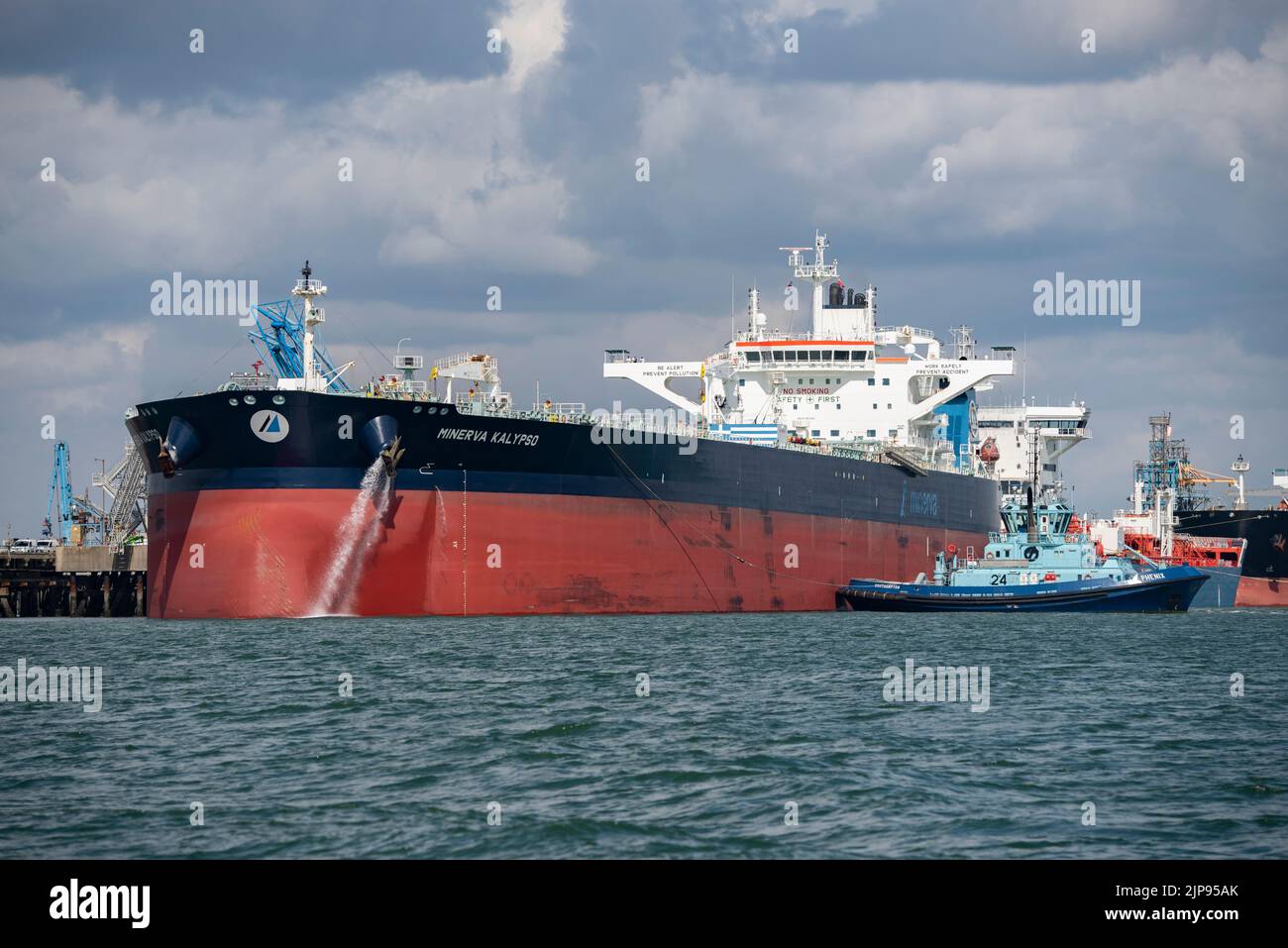Crude Oil Tanker Minerva Kalypso berthed at  the Exxon Mobil Fawley Oil Refinery in Southampton Water on the South coast of England Stock Photo