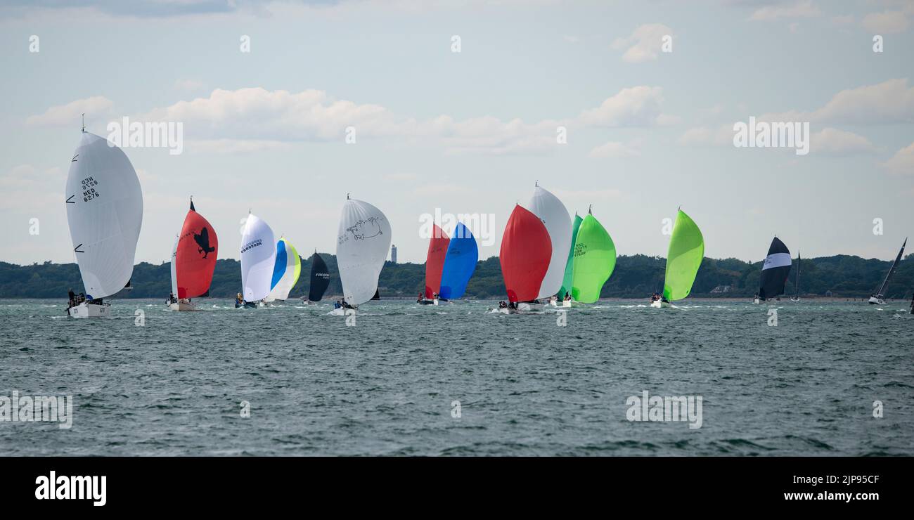 Competitors in the Cowes Week Regatta race for position in the Solent off the coast of the Isle of Wight in Southern England Stock Photo