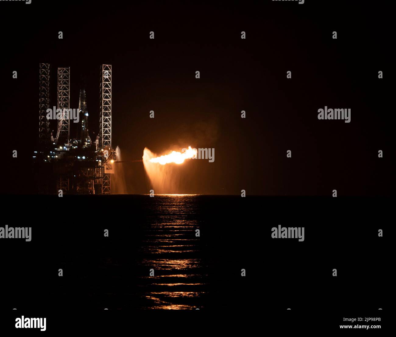 LNG Sea Platform Burning Excess Amount Stock Photo