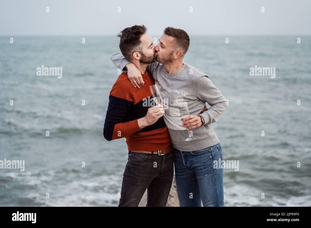 man-kiss-gay-guy-men-kisses-gays-homoual-lgbt-stock-photo