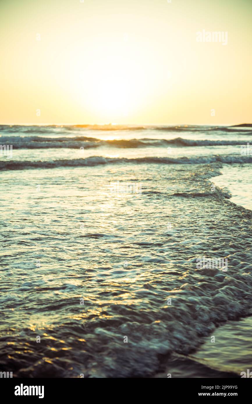 Landscape with sea sunset on beach Stock Photo - Alamy