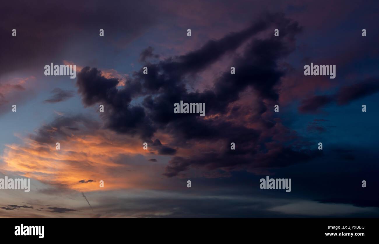 Expressive dramatic cloudscape with vibrant colors Stock Photo