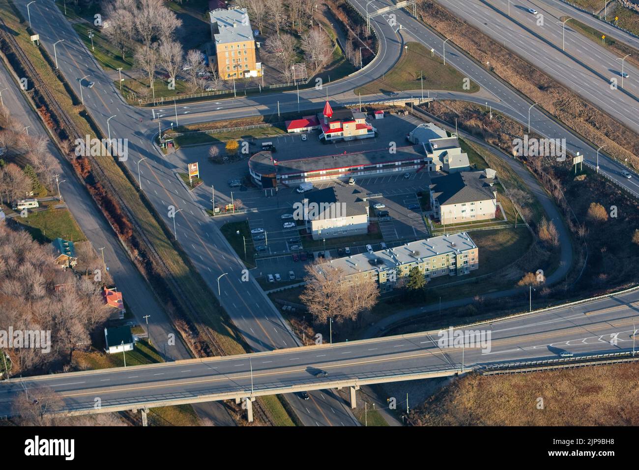 A motel, sandwiched between Boulevard St-Annes and Autoroute Dufferin-Montmorency, in Quebec city is pictured in this aerial photo November 11, 2009. A great commercial street in the past, Boulevard St-Annes started a low and painful decay with the construction of the highway in the 70'. Stock Photo