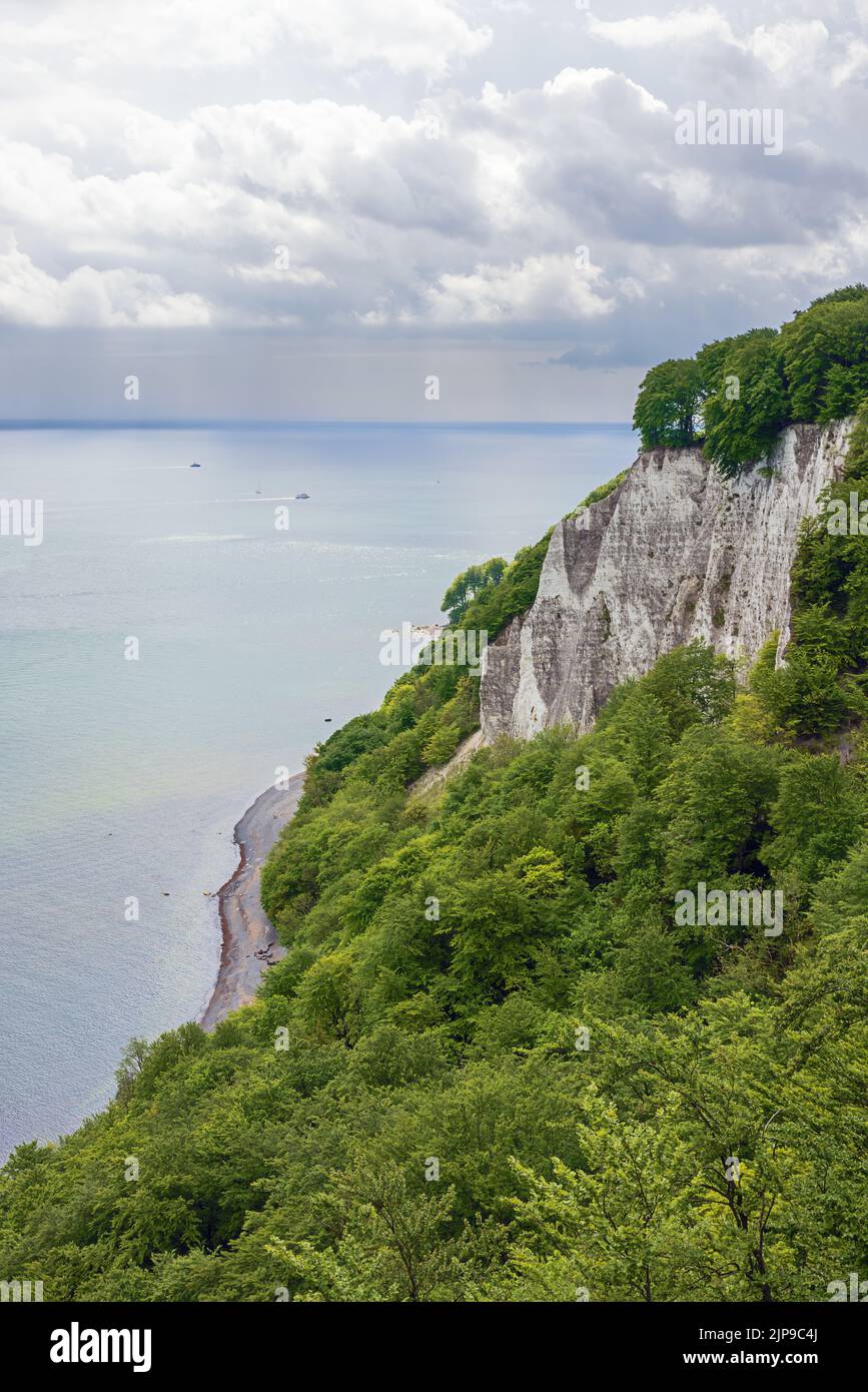 Chalk cliffs and rain showers around the Konigsstuhl on the island of ...