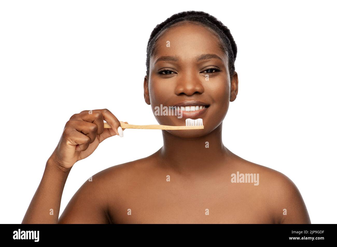 african woman cleaning teeth with toothbrush Stock Photo Alamy