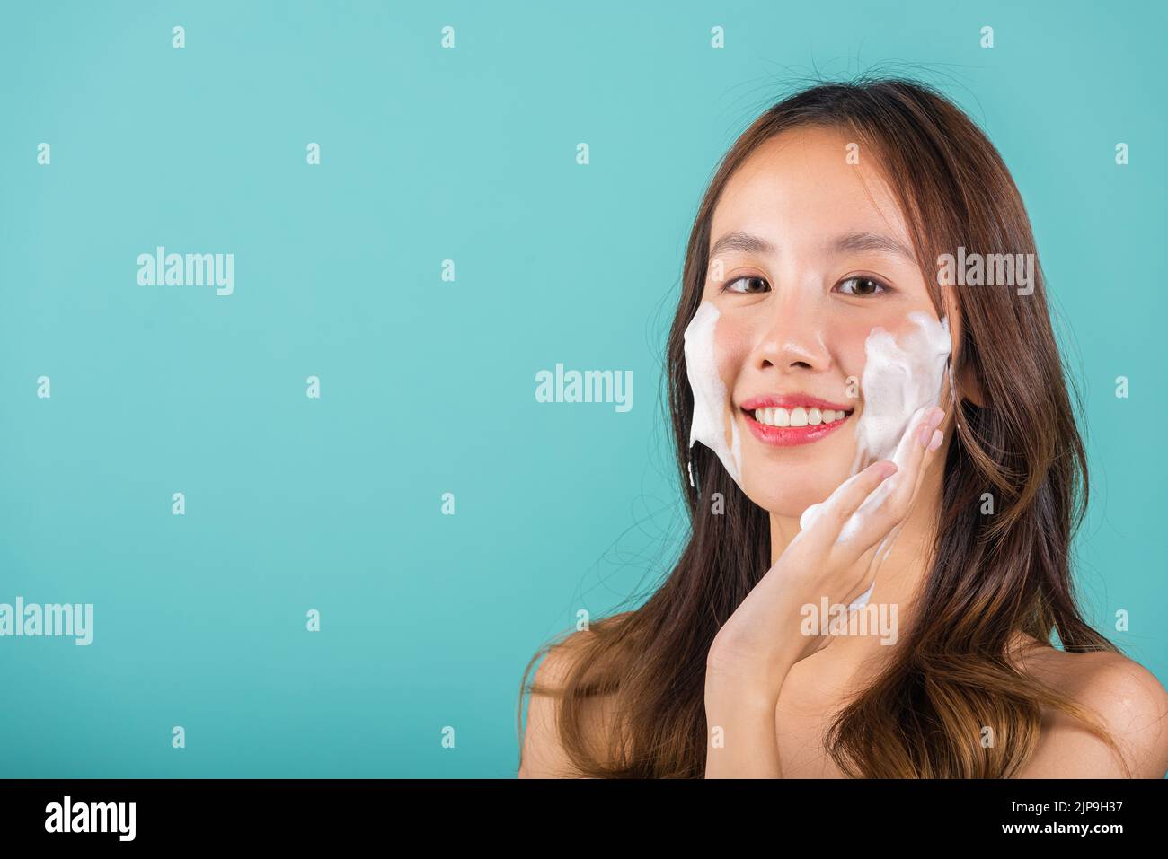 Asian woman face wash exfoliate scrub soap foam with skincare cleansing