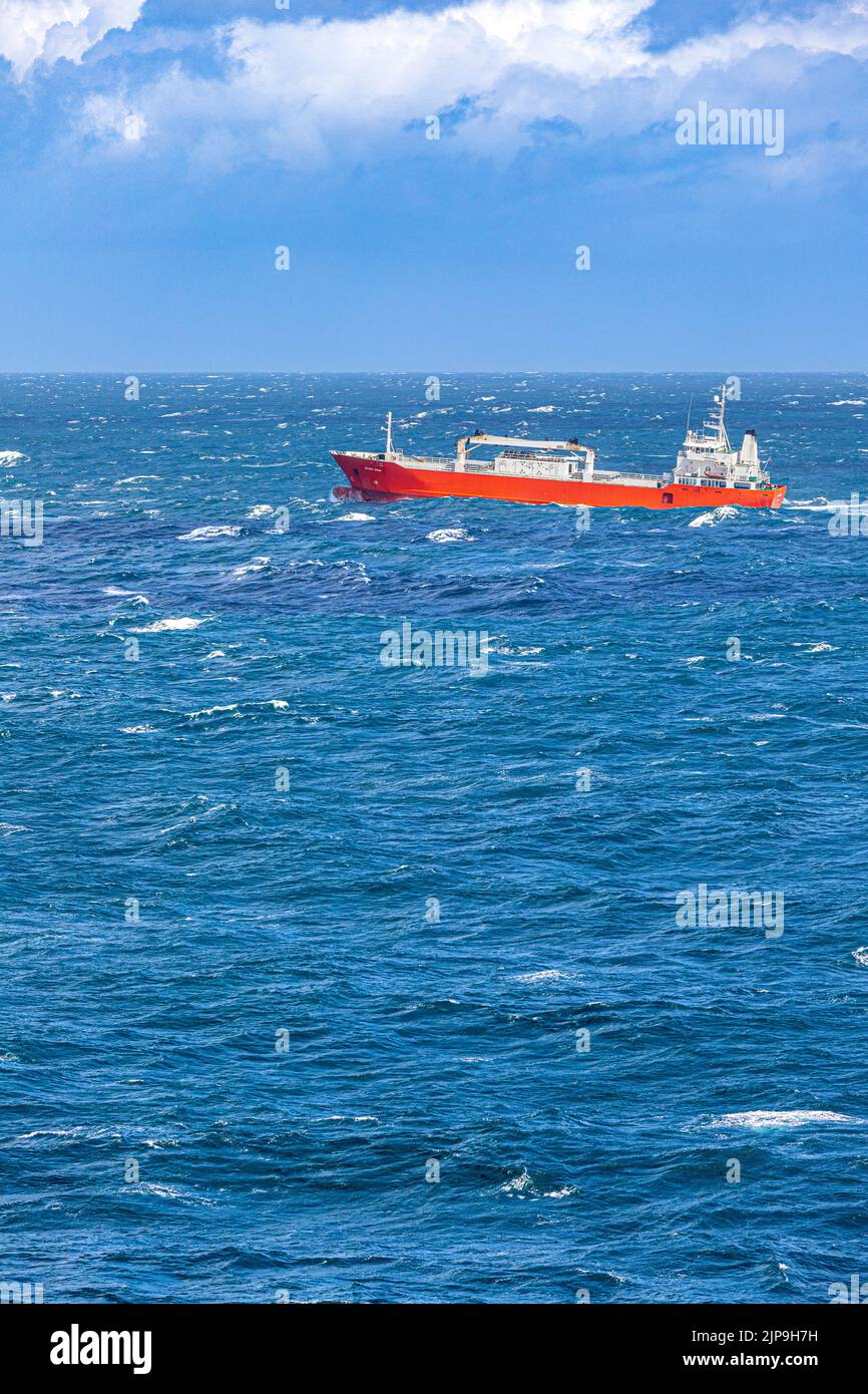 Refrigerated cargo ship Silver Star sailing (and pitching) in choppy seas in the North Sea off the coast of Denmark Stock Photo