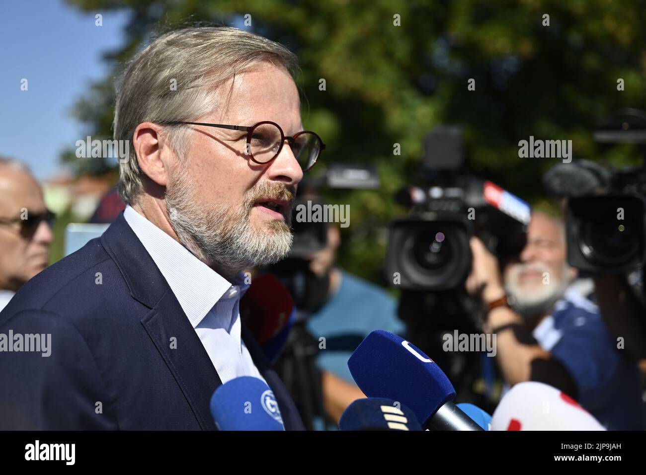 Czech Prime Minister Petr Fiala speaks to journalists after working meeting of members of Czech government in Liblice chateau near Melnik, Czech Republic, August 16, 2022. (CTK Photo/Ondrej Deml) Stock Photo