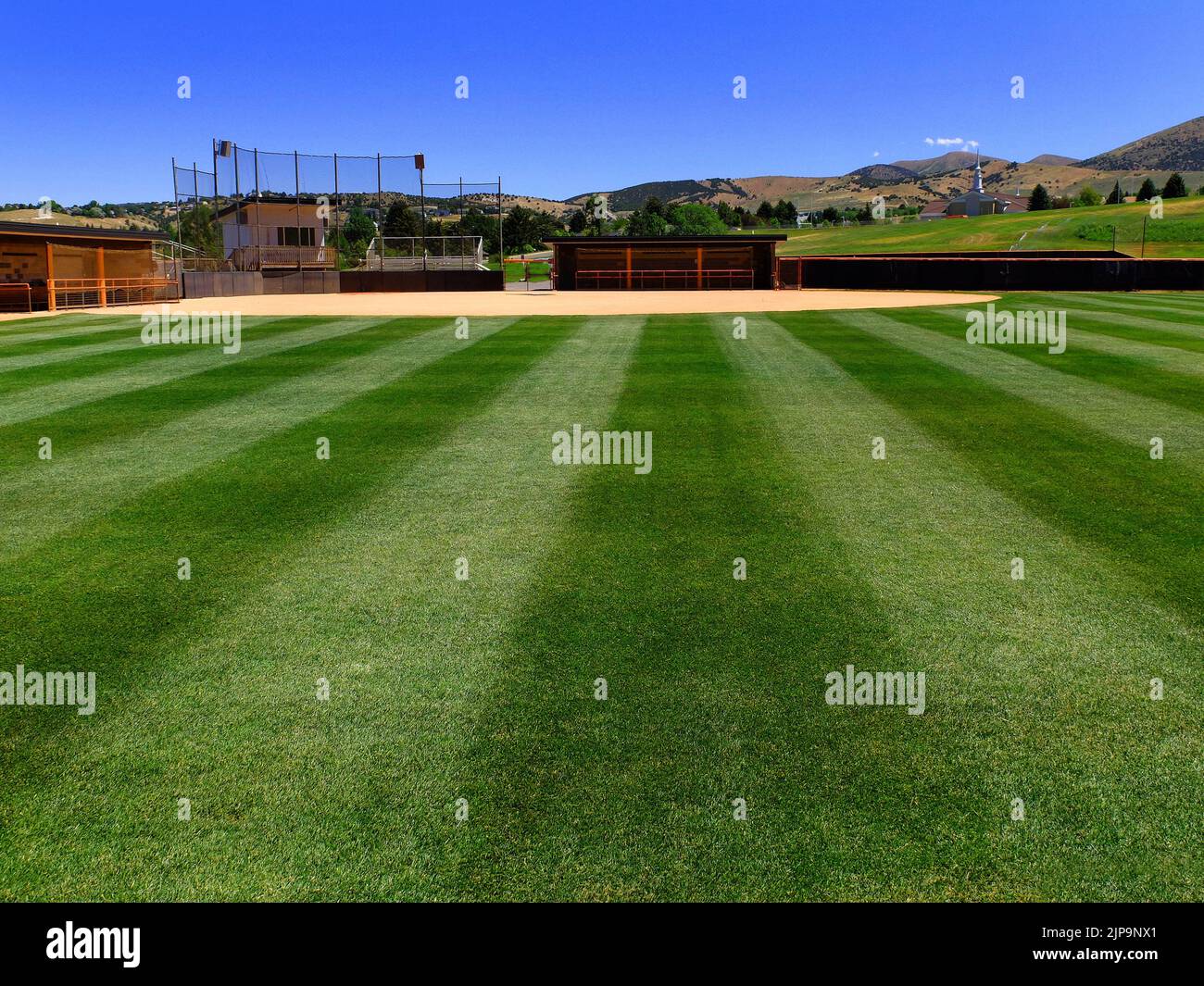 Baseball field diamond with pattern to cut green grass texture lines