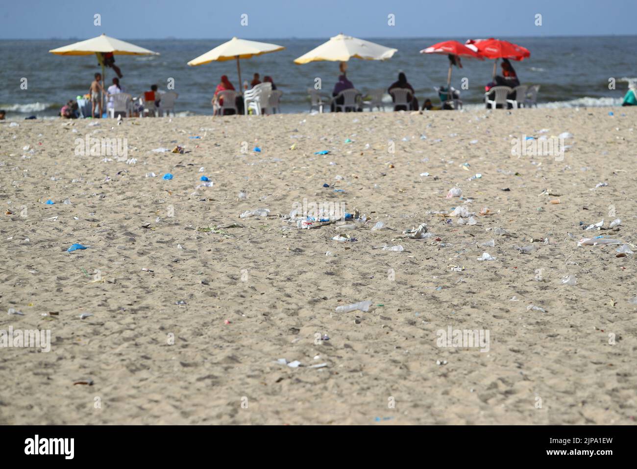 (220816) -- ALEXANDRIA, Aug. 16, 2022 (Xinhua) -- Photo taken on Aug. 13, 2022 shows a beach before the cleanup campaign in Alexandria, Egypt. On the beaches in the Egyptian city of Alexandria, a group of Egyptian young people are usually seen holding green and white plastic bags to collect the scattering waste. They are participants in a cleanup campaign organized by Banlastic Egypt, an environmental project launched by a group of youth in the Mediterranean city. The project seeks to raise the public's awareness of plastic pollution and how single-use plastic waste harms marine life if i Stock Photo
