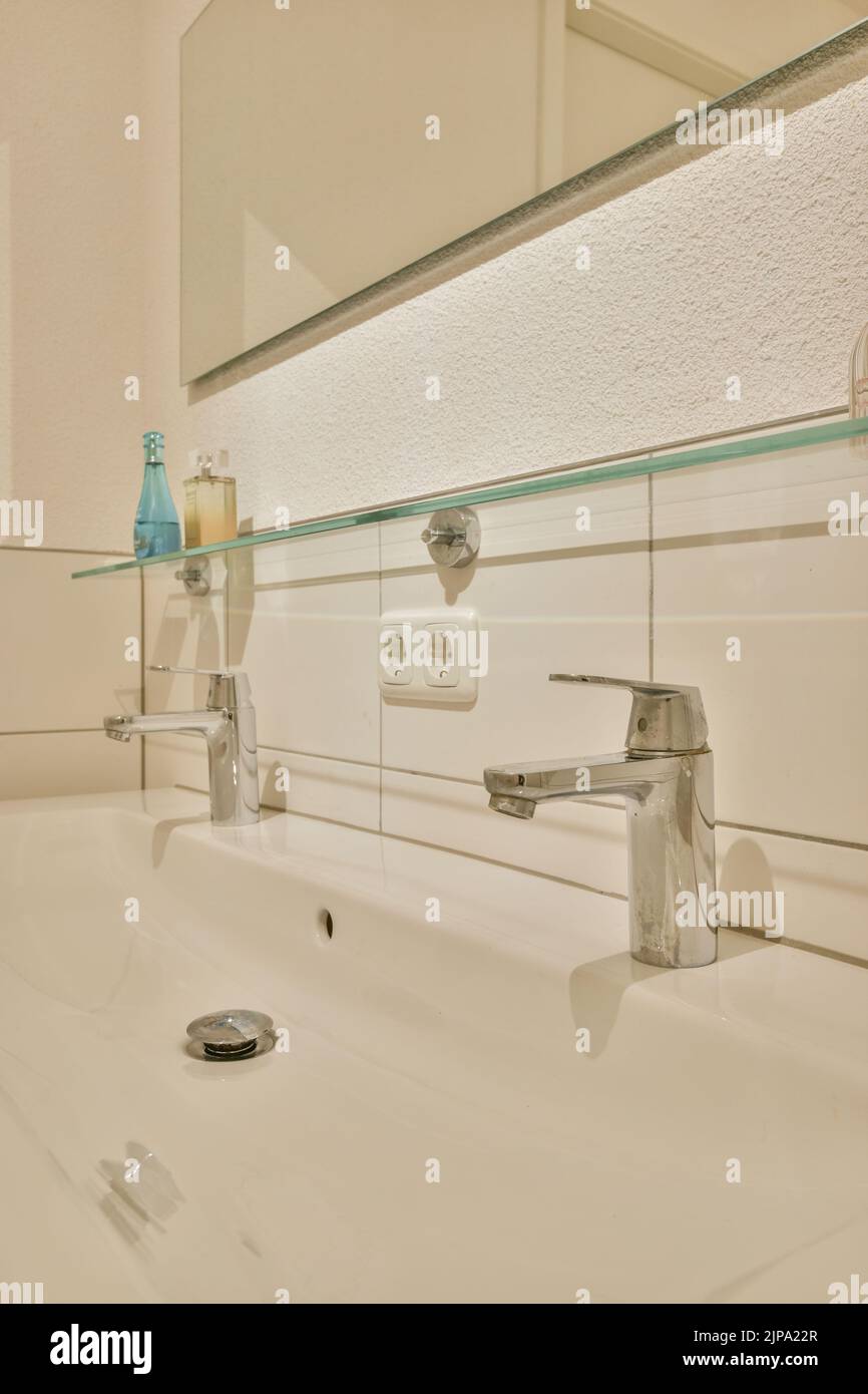 Modern home interior design of white bathroom with open bathtub and