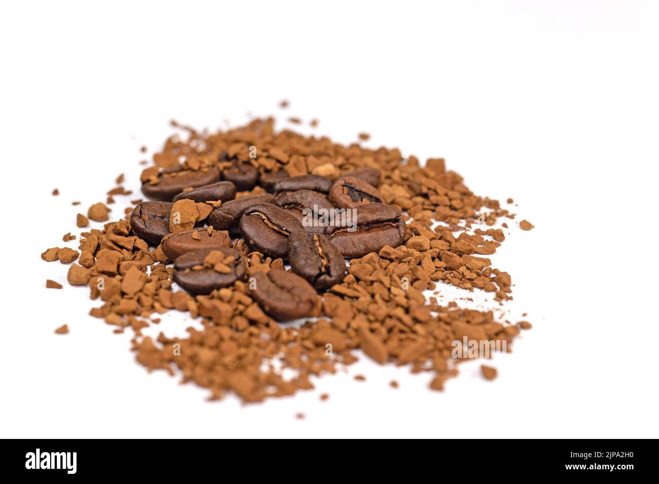 Instant coffee beans against a white background Stock Photo