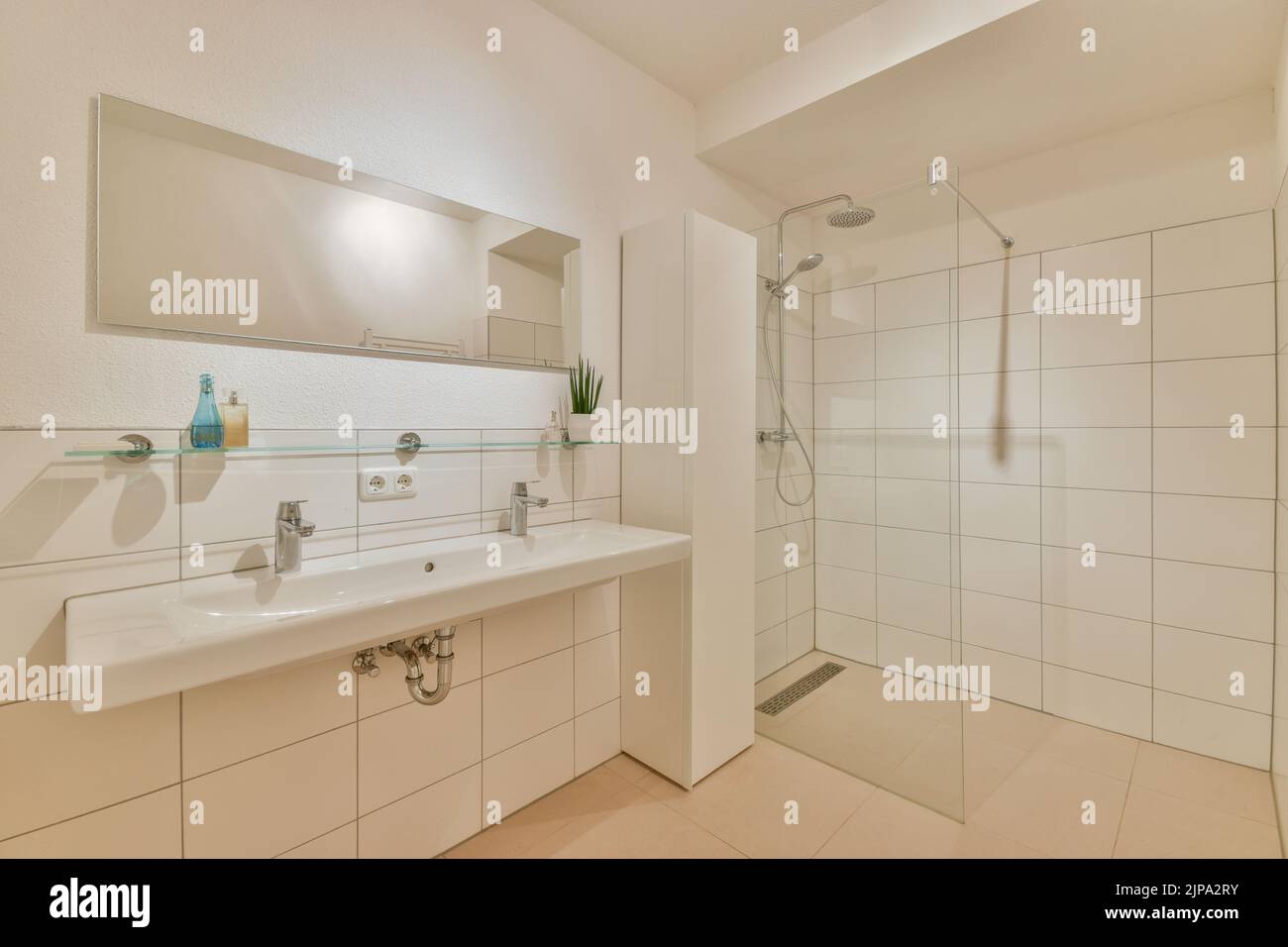 Modern home interior design of white bathroom with open bathtub and