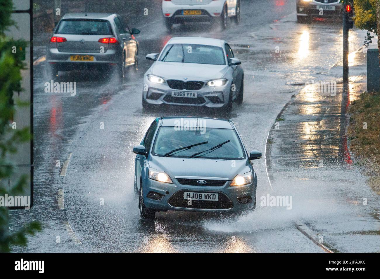 Chippenham, UK, 16th August, 2022. Drivers are pictured braving very heavy rain in Chippenham as showers make their way across Southern England. Credit: Lynchpics/Alamy Live News Stock Photo